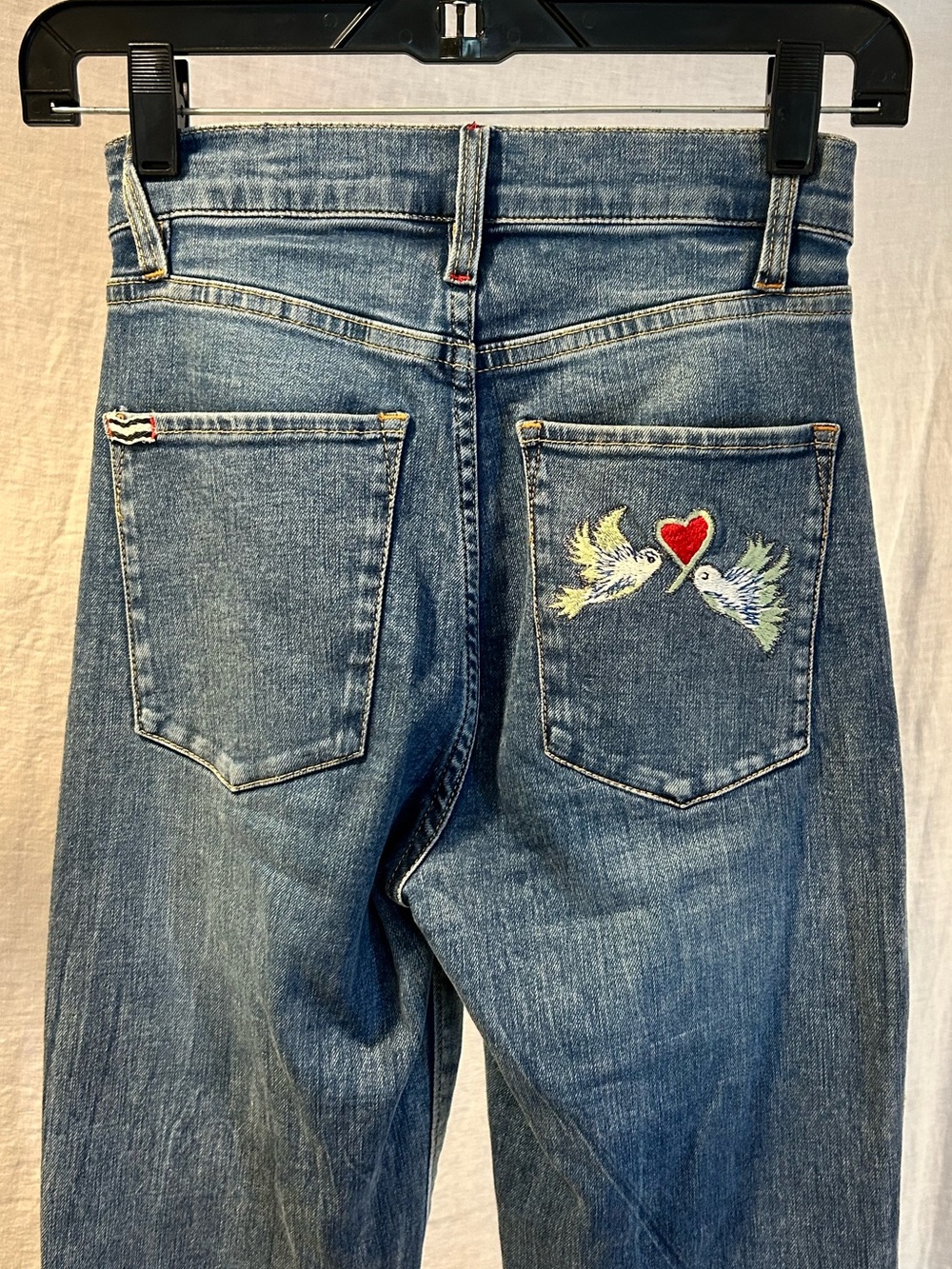 Alice + Olivia Denim Flare Jeans with Multicolor Paisley Embroidery - Picture 5 of 16